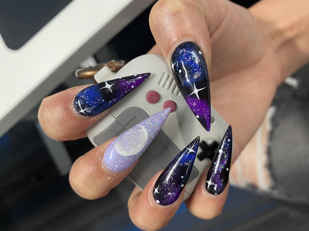 Simple Galaxy set done by nail tech. Love how she did the moon 😍 ...